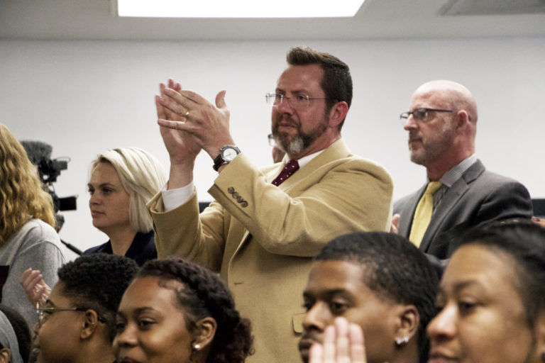 Kris Steele applauds
